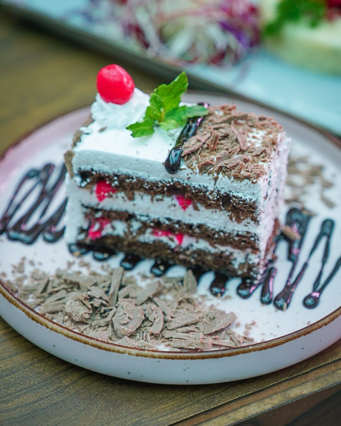 Layered chocolate cake dessert at Bier Loft