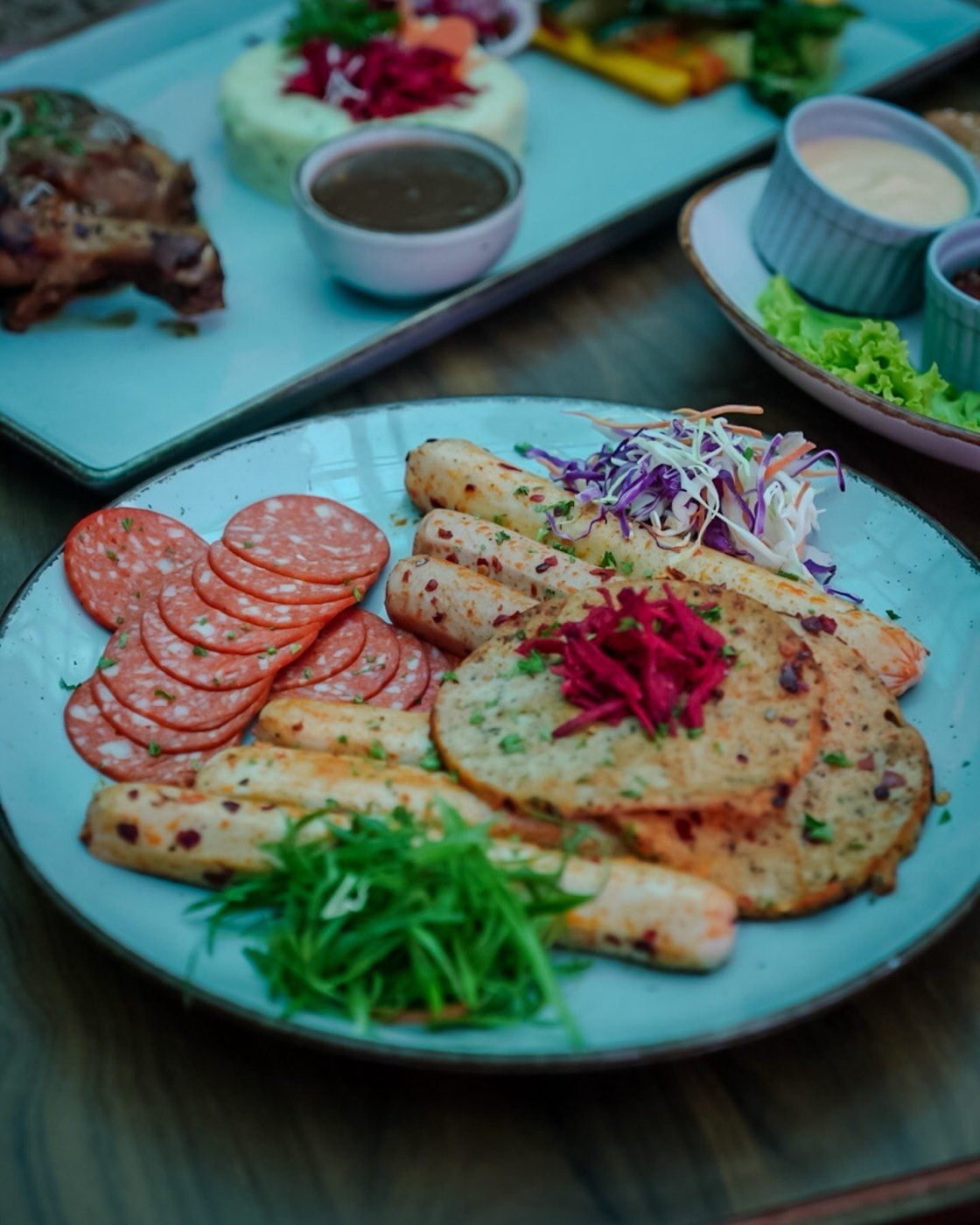 Cold cuts and grilled sausage platter at Bier Loft
